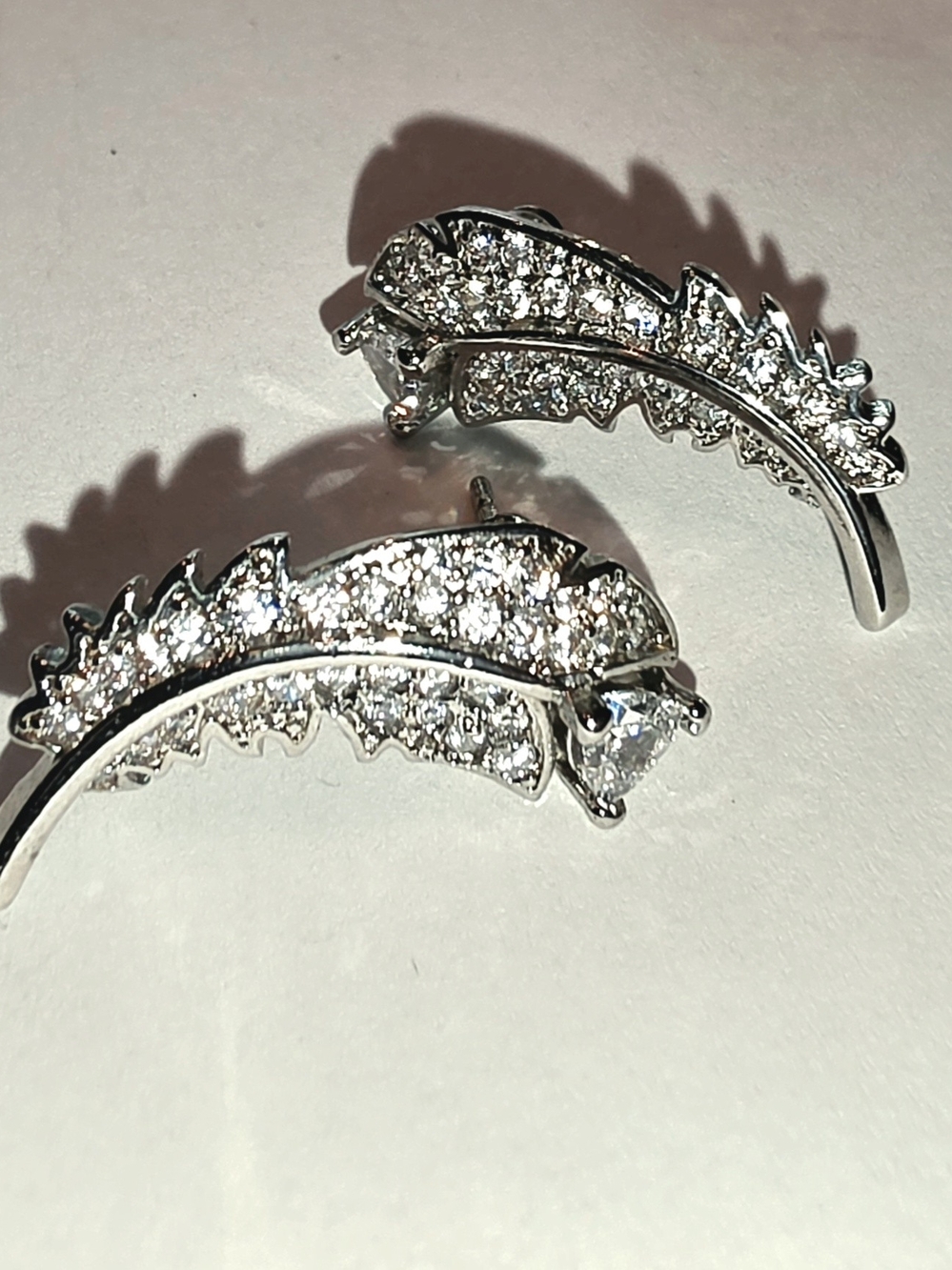 Silver Crystal Feather Stud Earrings - Sparkling Leaf Design